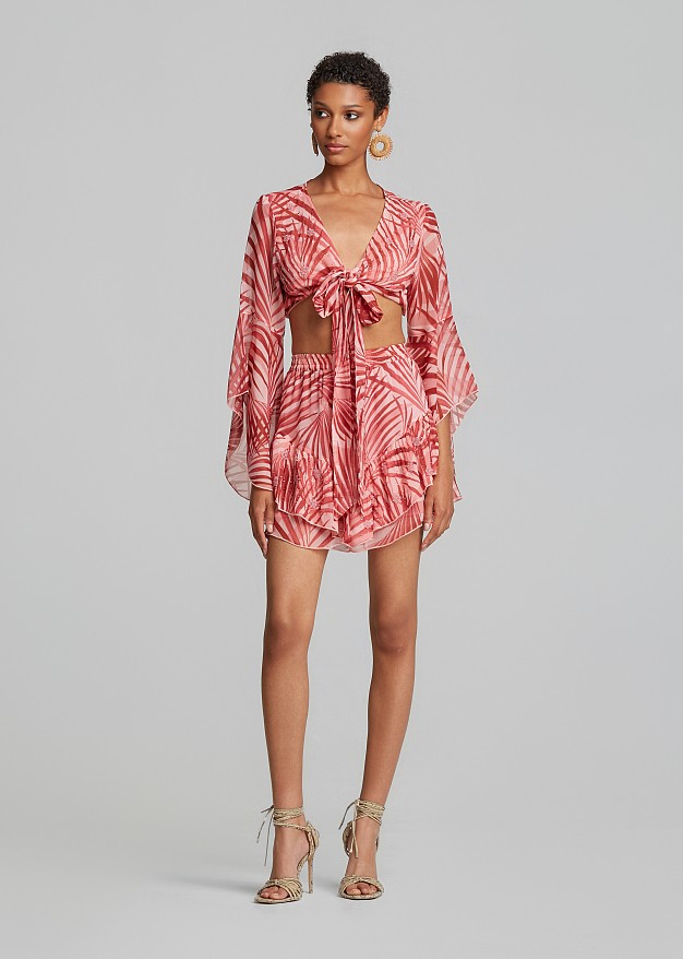 Printed top with a tie and bell sleeves