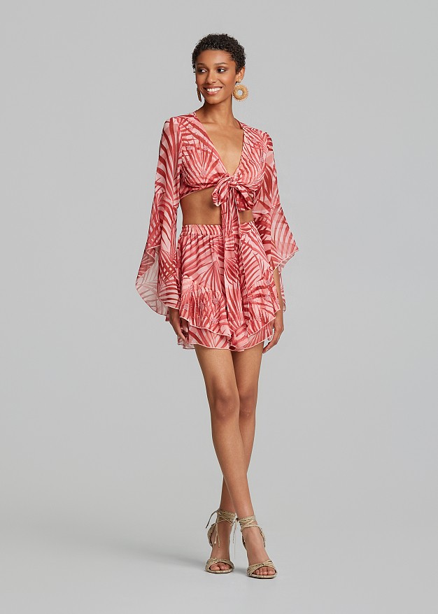 Printed top with a tie and bell sleeves