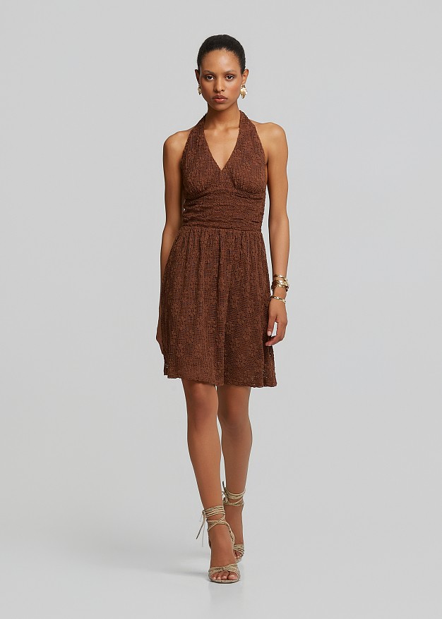 Lace mini dress with halter neck tie