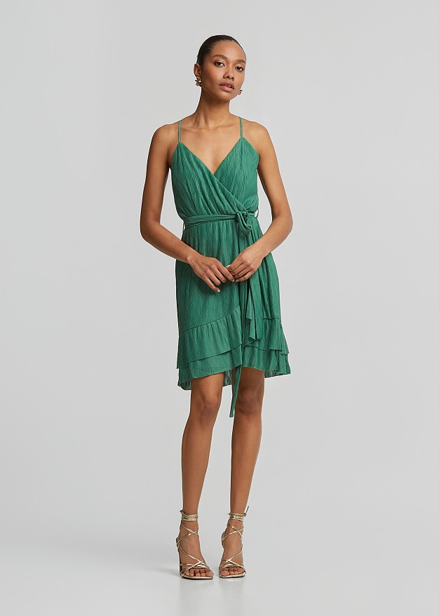 Wrap mini dress in asymmetric ruffles