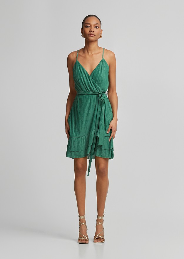 Wrap mini dress in asymmetric ruffles
