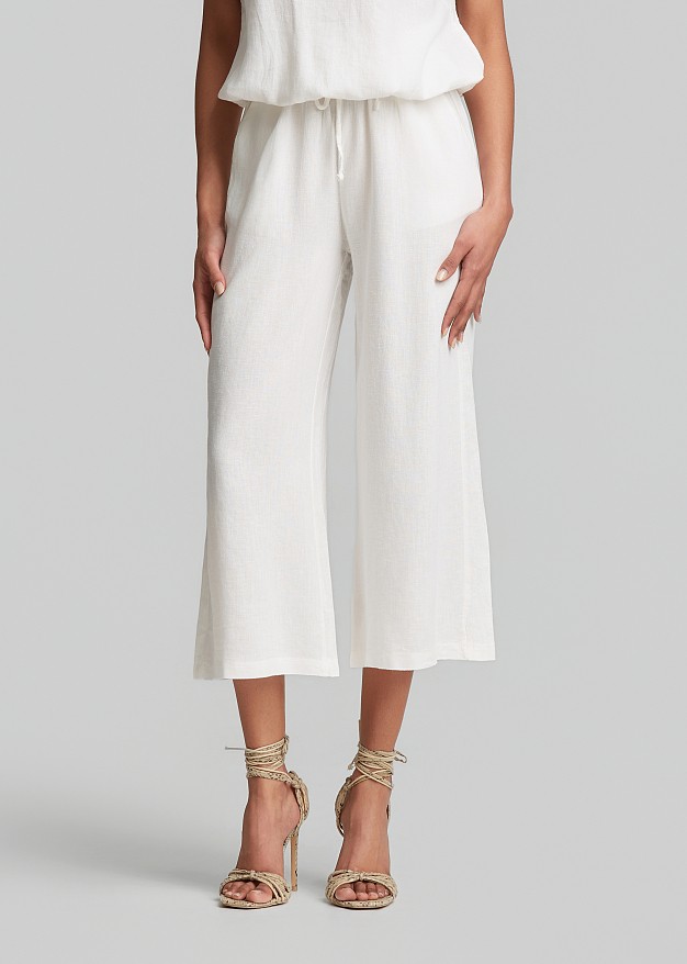 Cropped trousers in a linen-look fabric