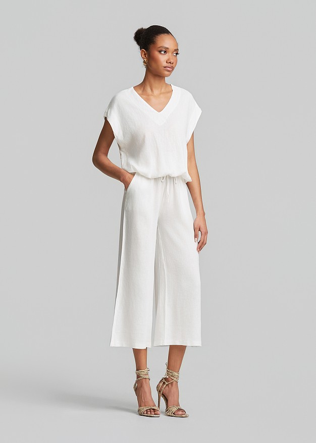 Cropped trousers in a linen-look fabric