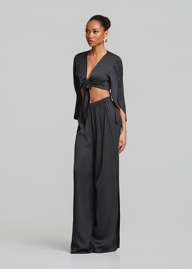 Wide leg trousers with satin finish and slits