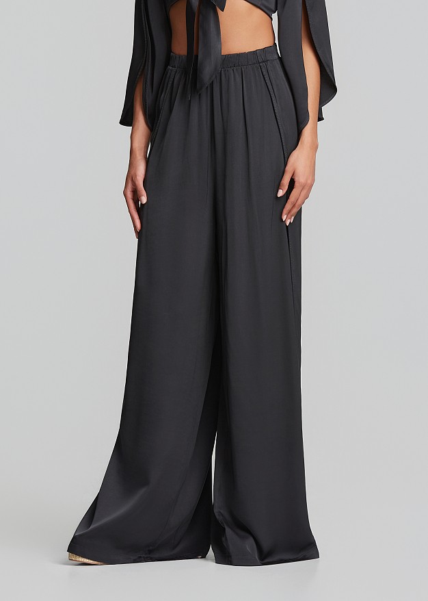 Wide leg trousers with satin finish and slits