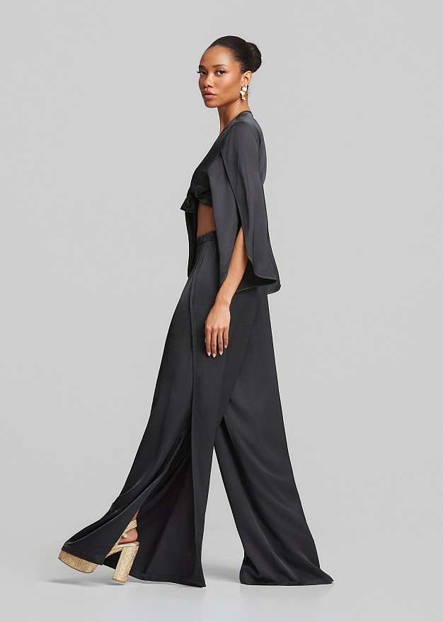 Wide leg trousers with satin finish and slits