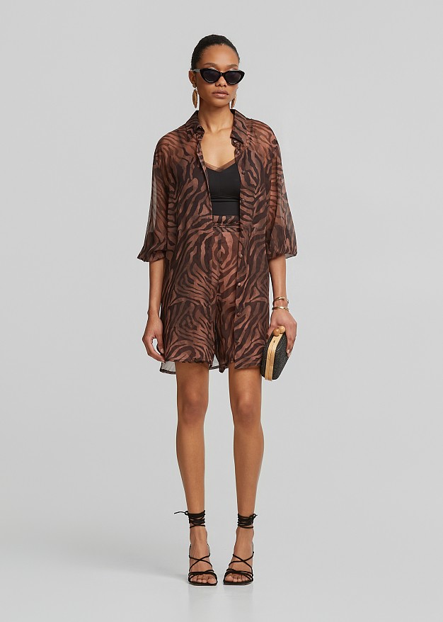 Sheer shirt with leopard print