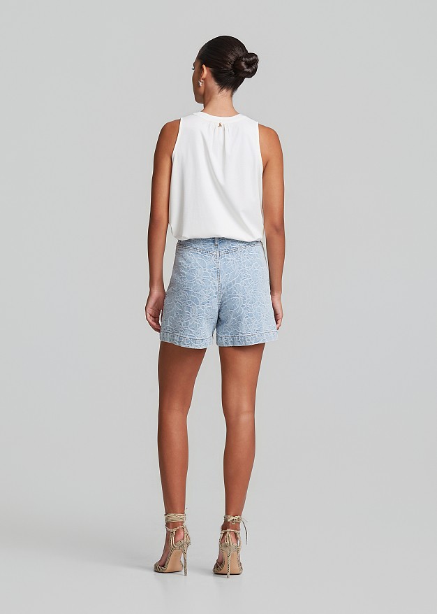Top with a cut-out  and V neckline