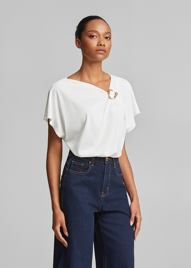 Blouse with ruching and a decorative buckle