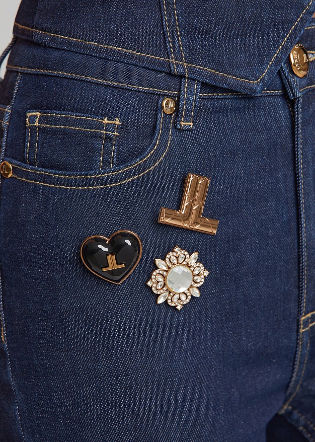 High waisted flared jeans with brooches