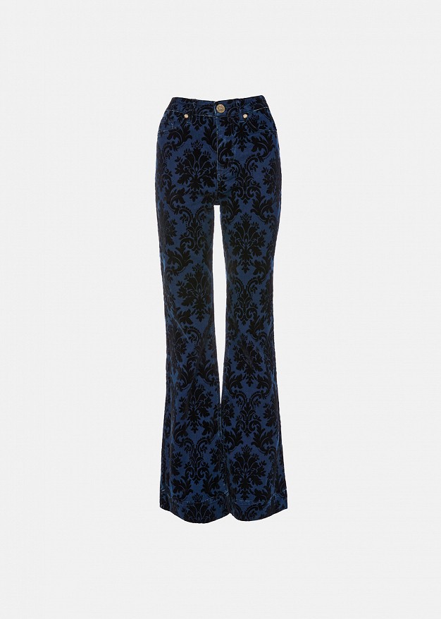 Flared jeans with an embossed velvet paisley print