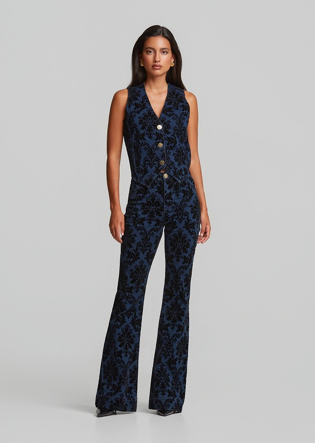 Flared jeans with an embossed velvet paisley print