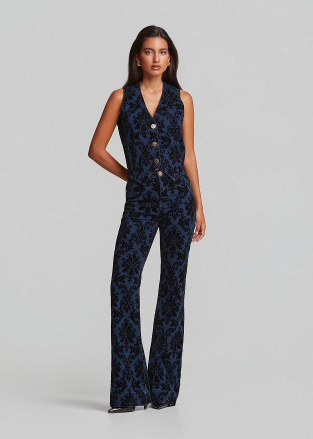 Flared jeans with an embossed velvet paisley print