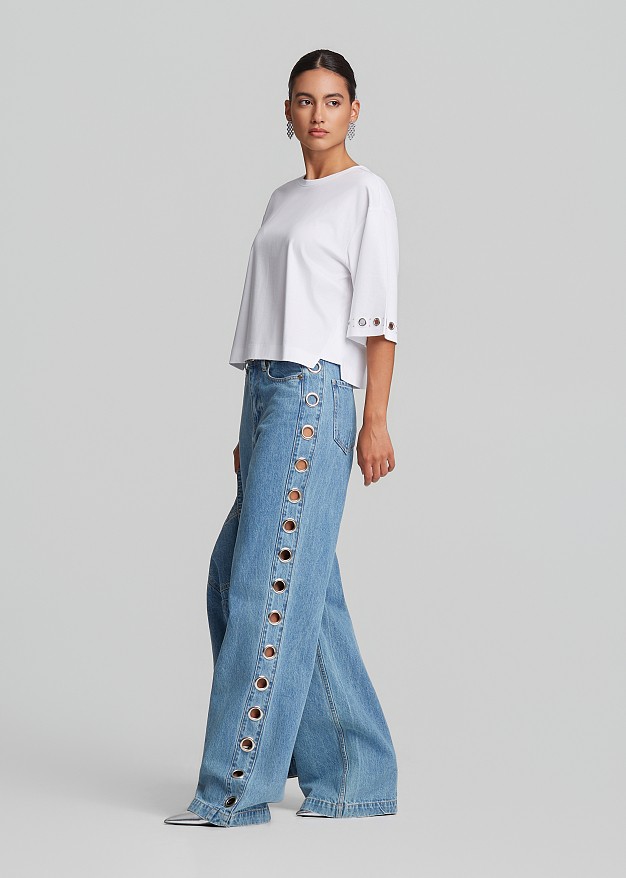 Denim trousers in metallic side details