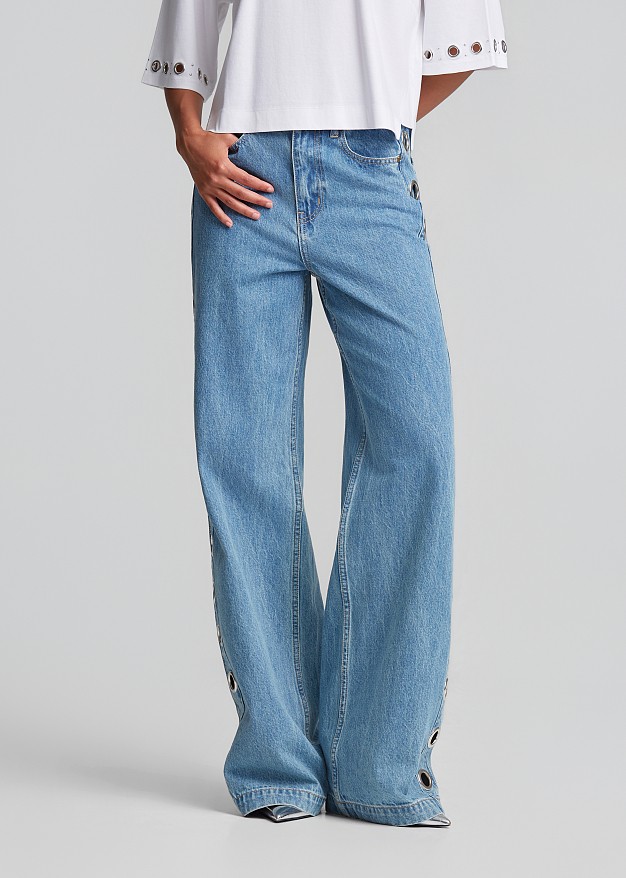 Denim trousers in metallic side details