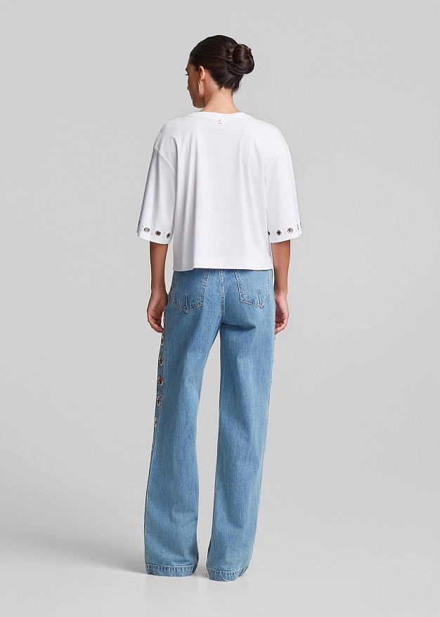Denim trousers in metallic side details