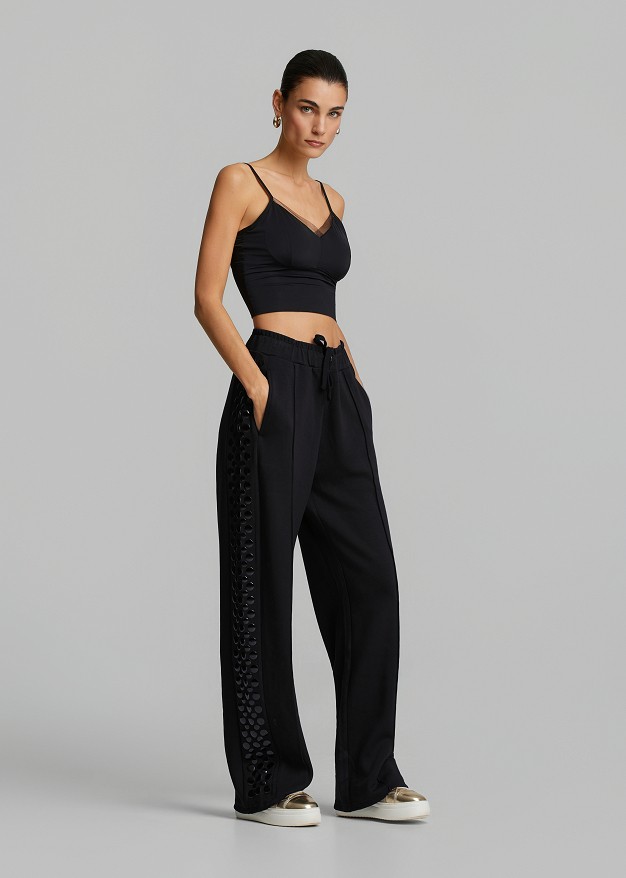 Sweatpants with decorative side details