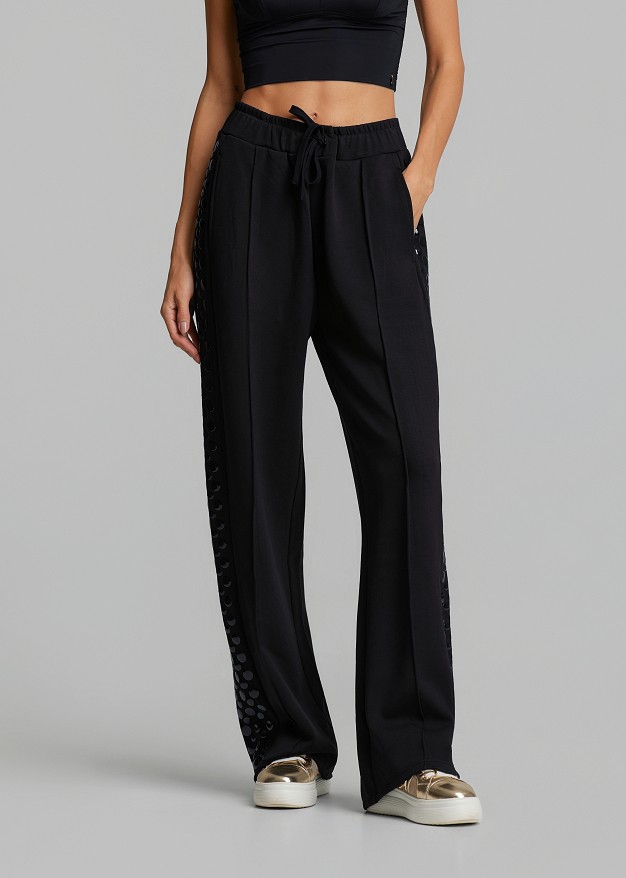Sweatpants with decorative side details