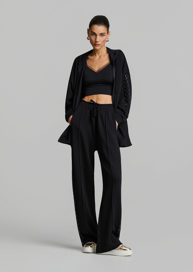 Sweatpants with decorative side details