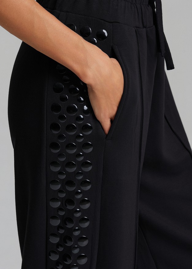 Sweatpants with decorative side details