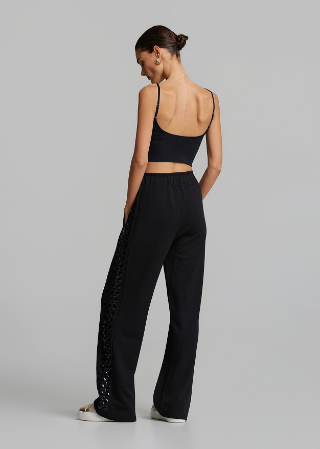 Sweatpants with decorative side details