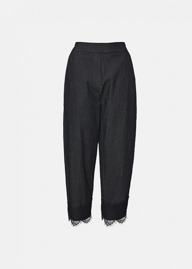 Trousers in soft denim and decorative lace hem