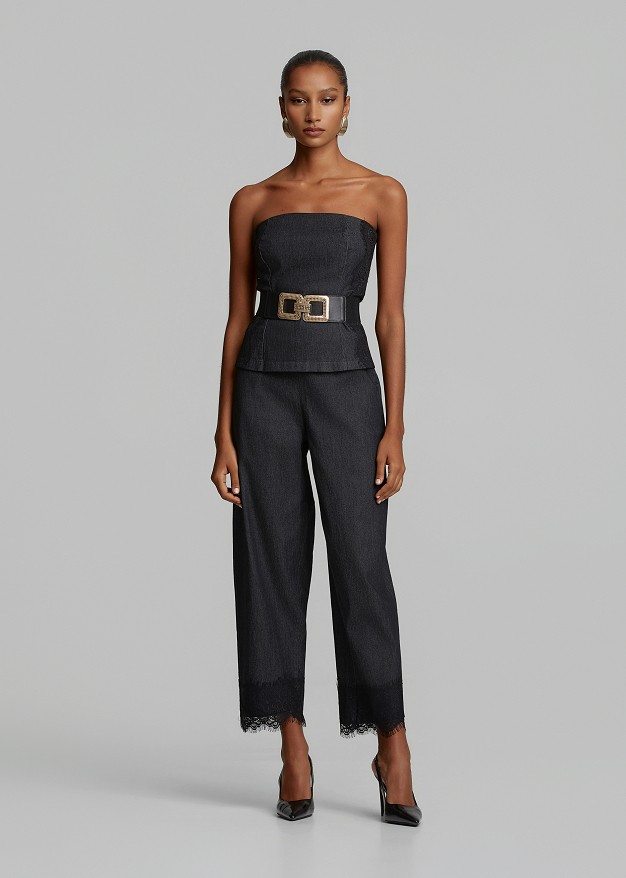 Trousers in soft denim and decorative lace hem