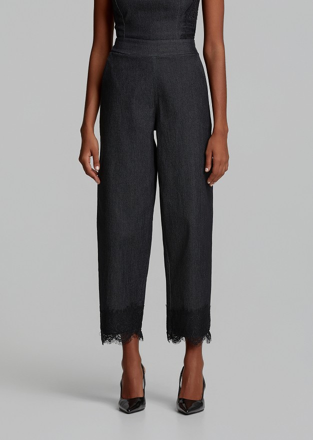 Trousers in soft denim and decorative lace hem