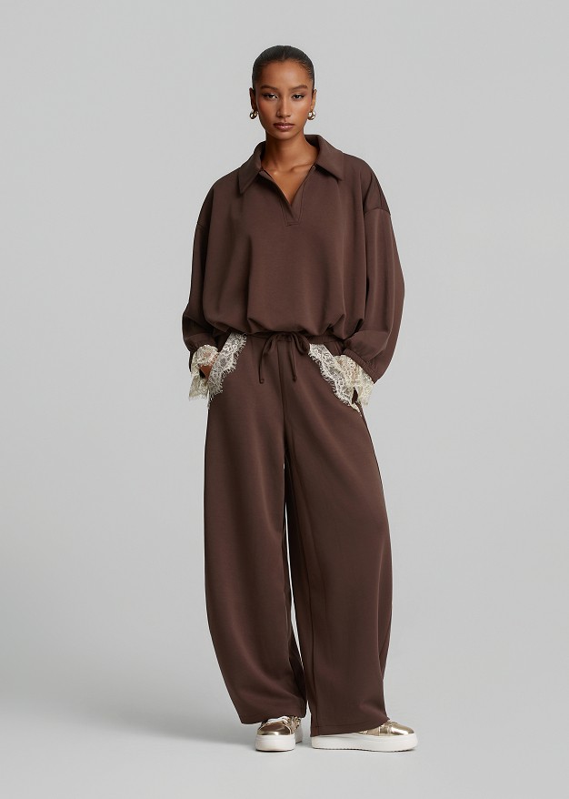 Barrel-leg trousers with lace detailing