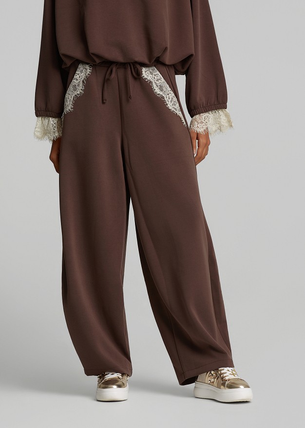 Barrel-leg trousers with lace detailing