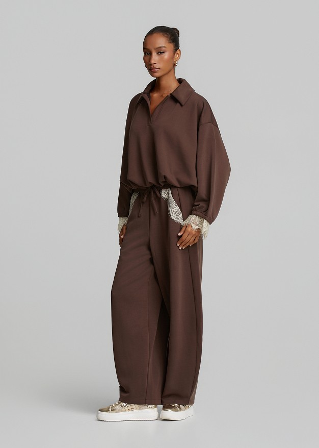 Barrel-leg trousers with lace detailing