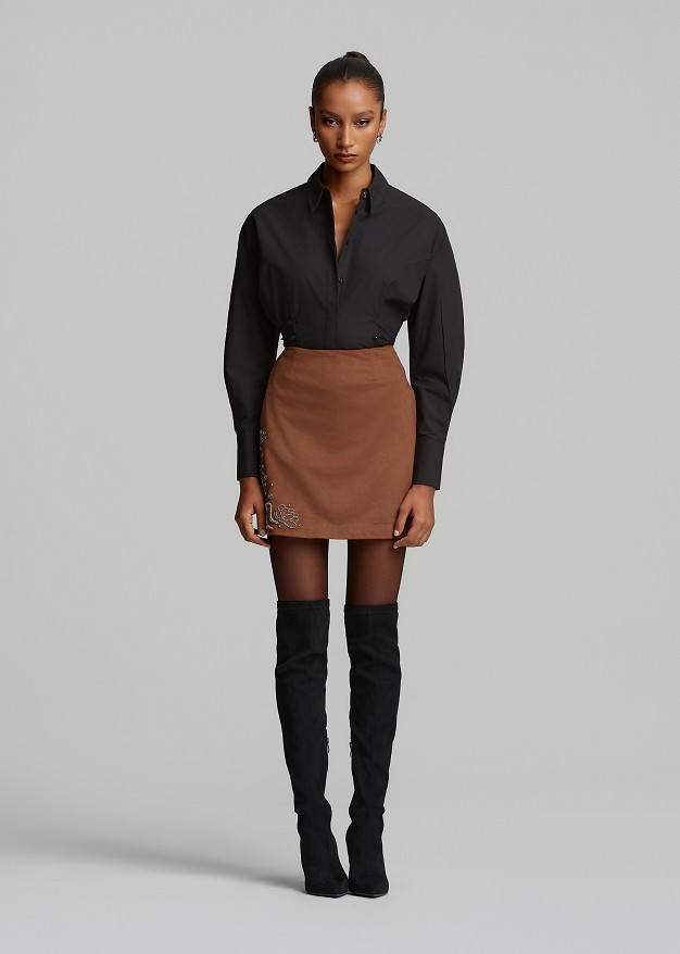 Faux-suede mini skirt with decorative beads