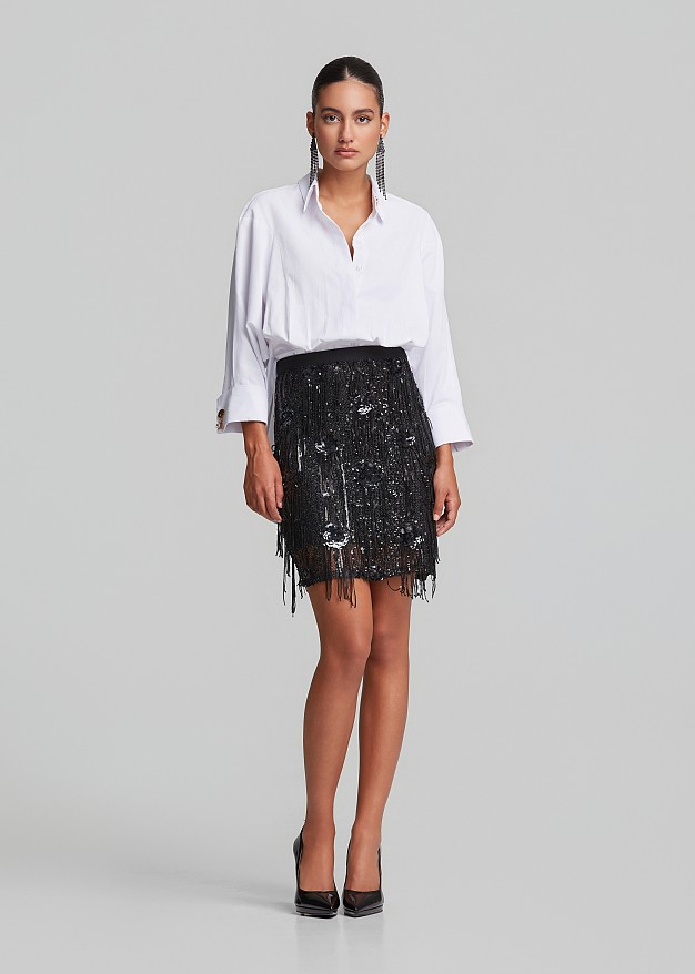 Fitted asymmetric shirt with peplum