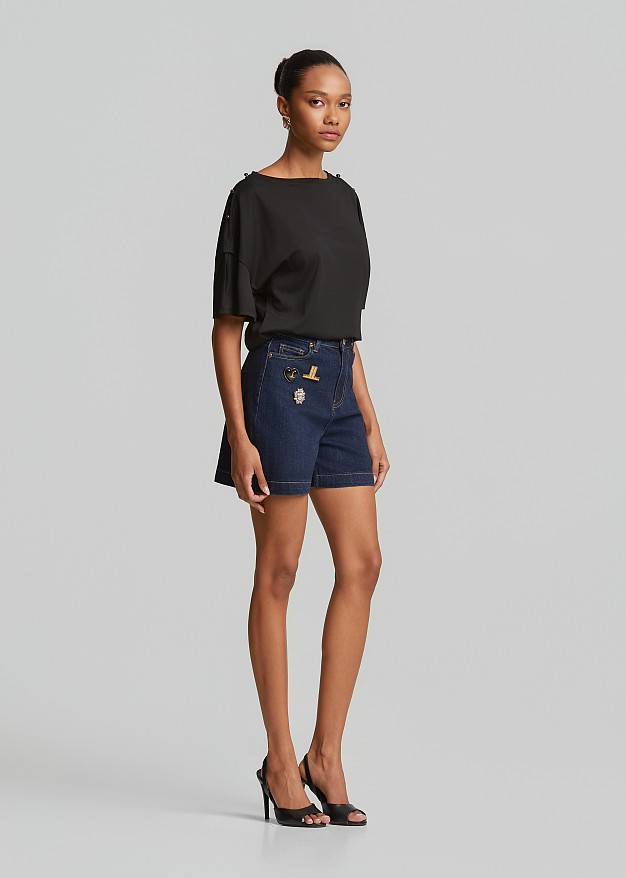 Denim shorts in statement pins