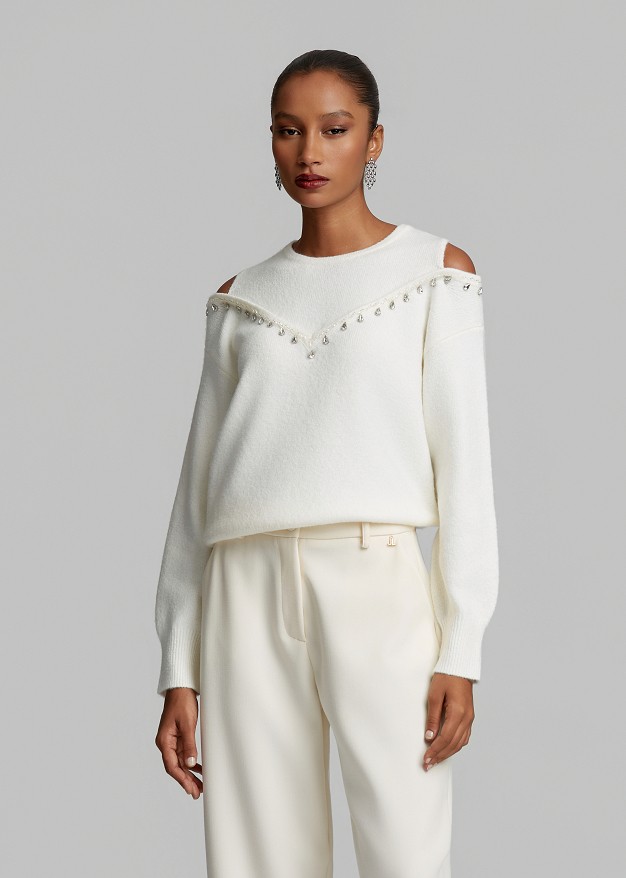 Sweater with decorative crystals
