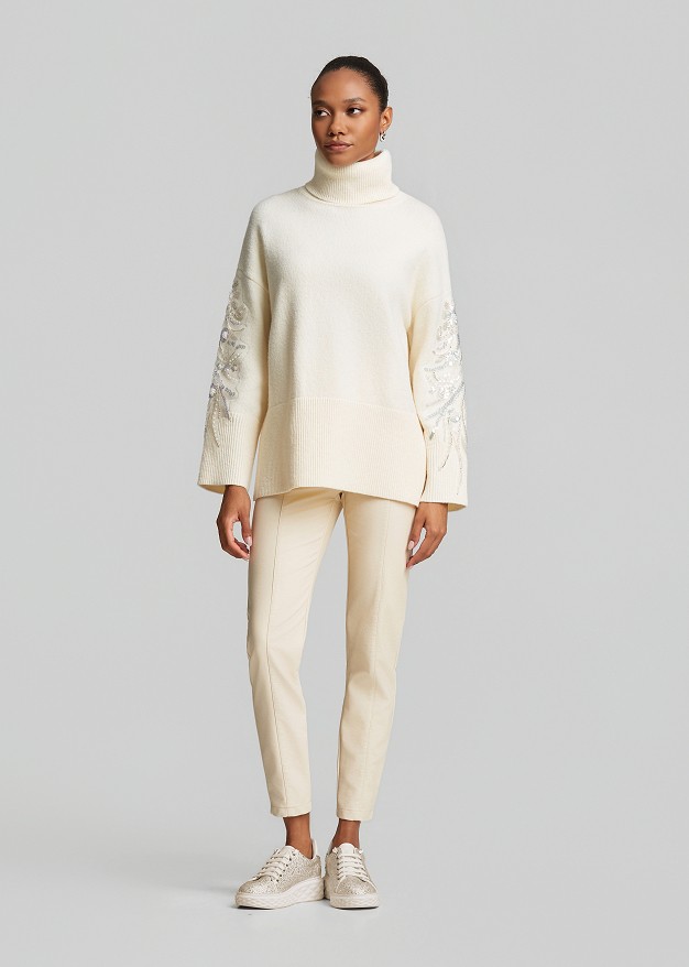 Oversized sweater with rhinestone embroidery