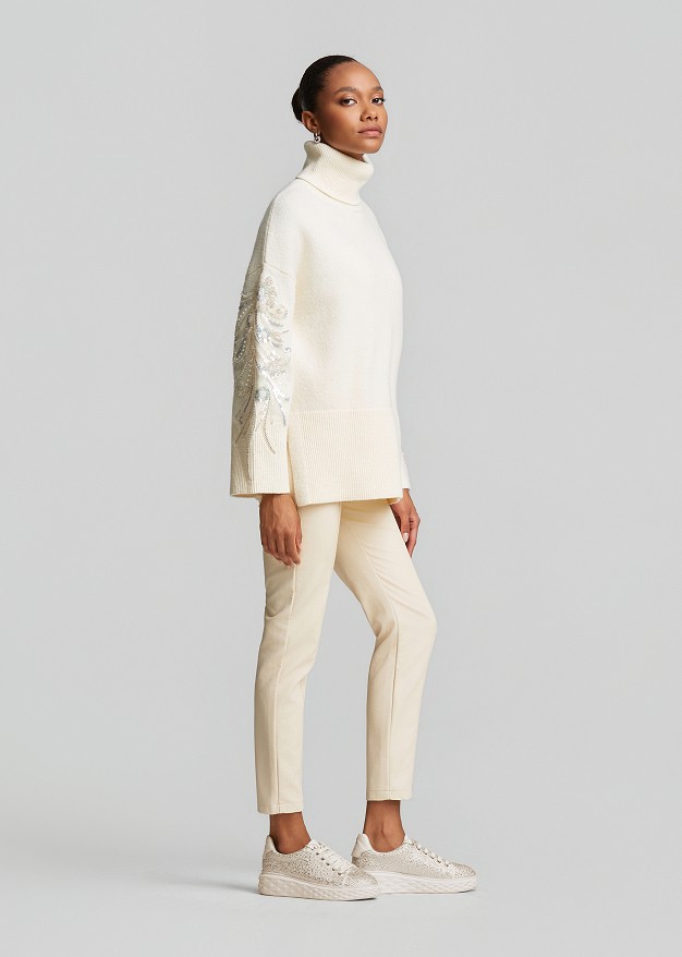 Oversized sweater with rhinestone embroidery