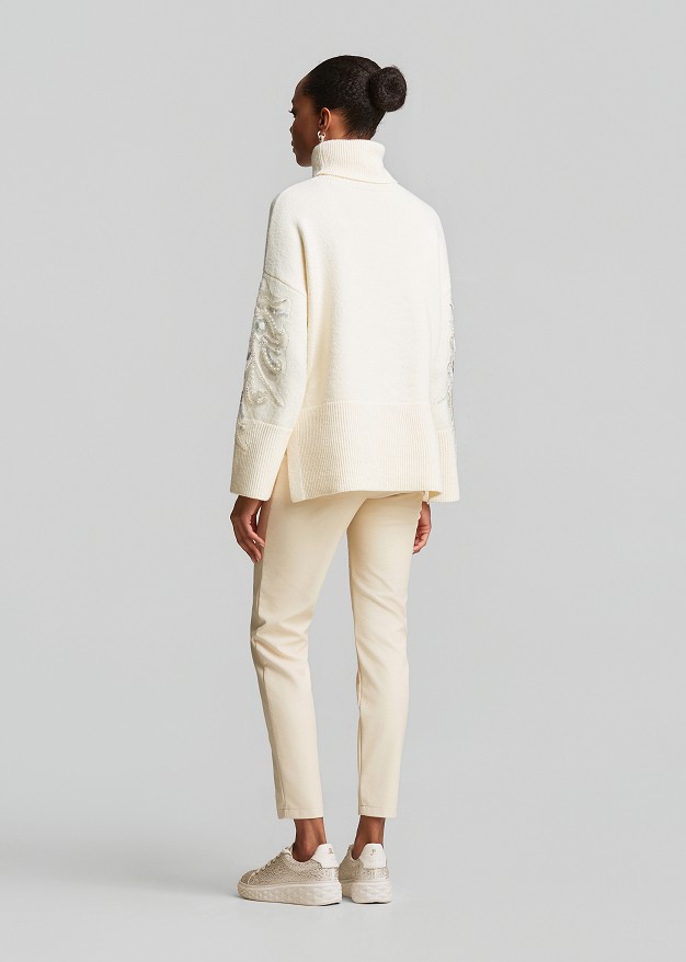 Oversized sweater with rhinestone embroidery