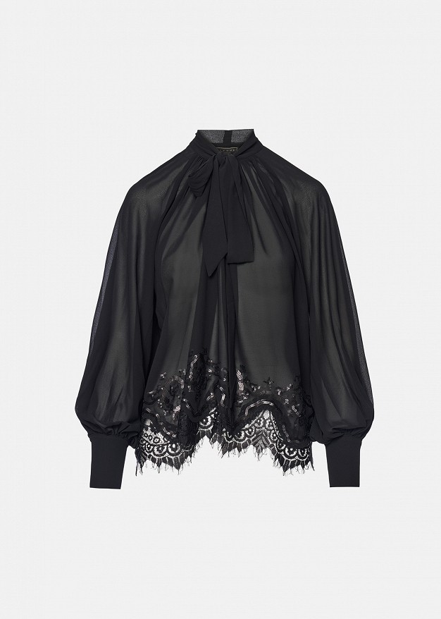 Sheer top with lace trim