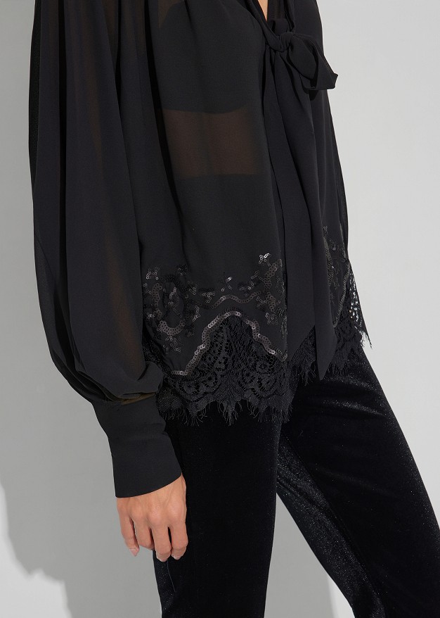 Sheer top with lace trim