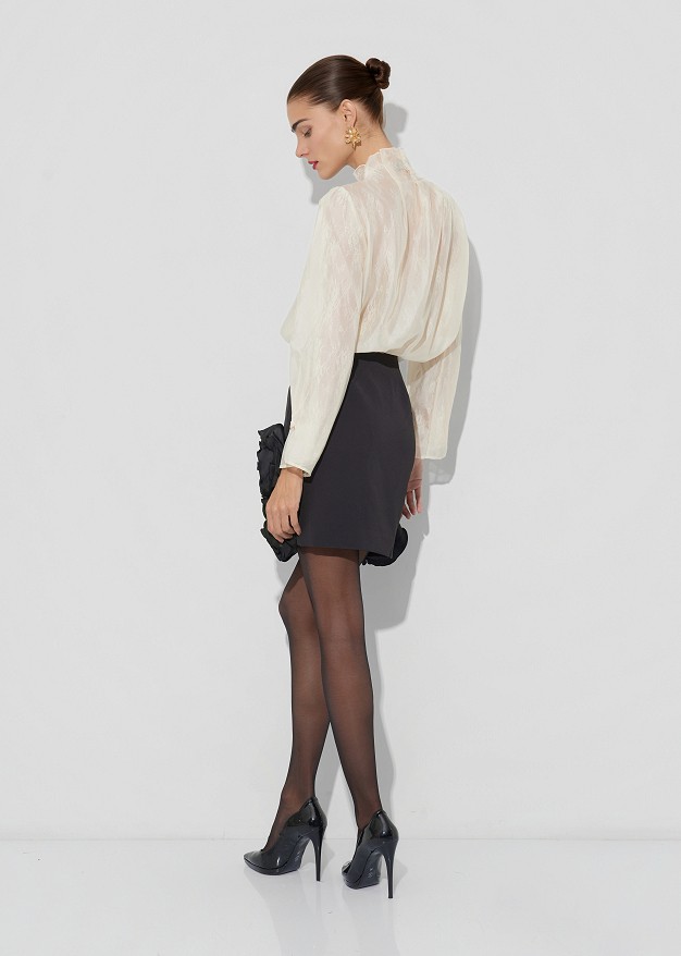 High-neck blouse with an internal lace lining