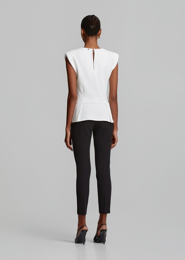 Peplum sleeveless top