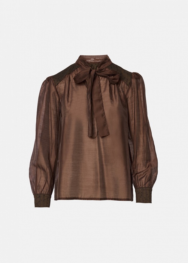 Sheer blouse featuring polka-dot details