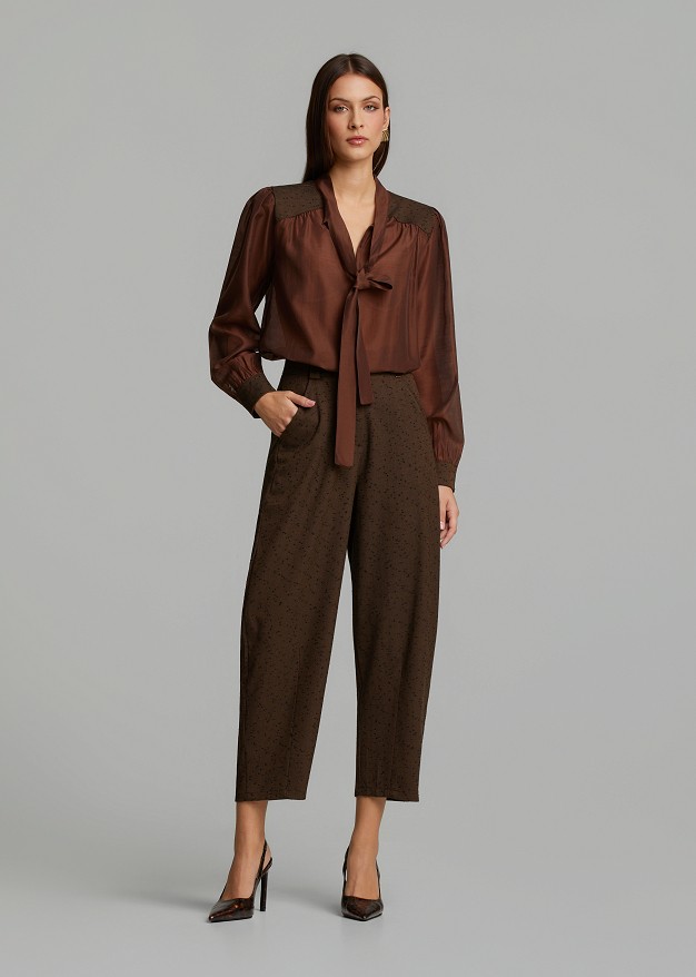 Sheer blouse featuring polka-dot details