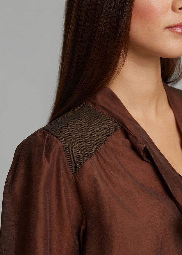 Sheer blouse featuring polka-dot details