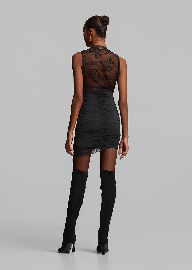 Mini dress in satin look and high-neck lace layer