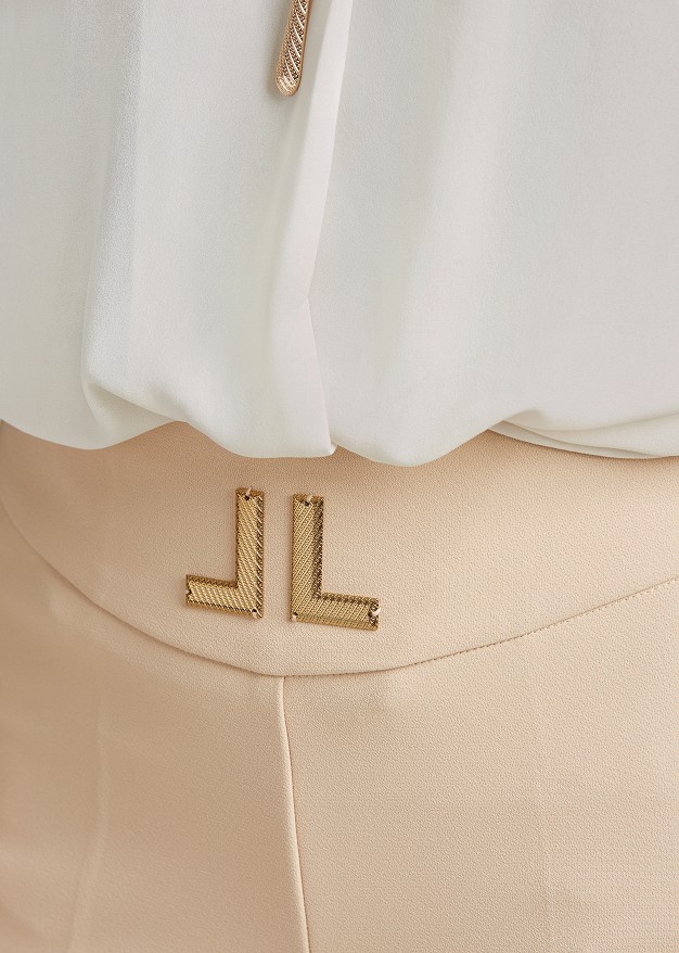 High-waisted flared crepe trousers