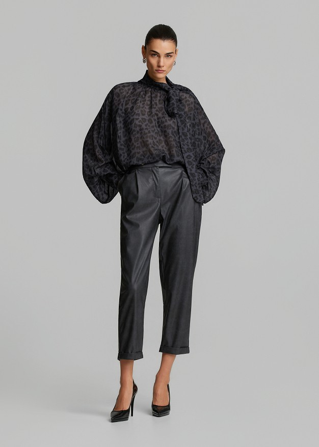 Baggy faux-leather trousers