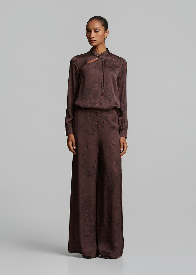 Printed trousers in satin-look finish