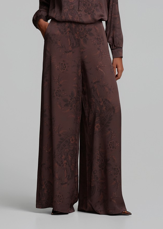 Printed trousers in satin-look finish